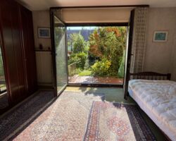 Wohn-/Esszimmer mit direktem Gartenzugang